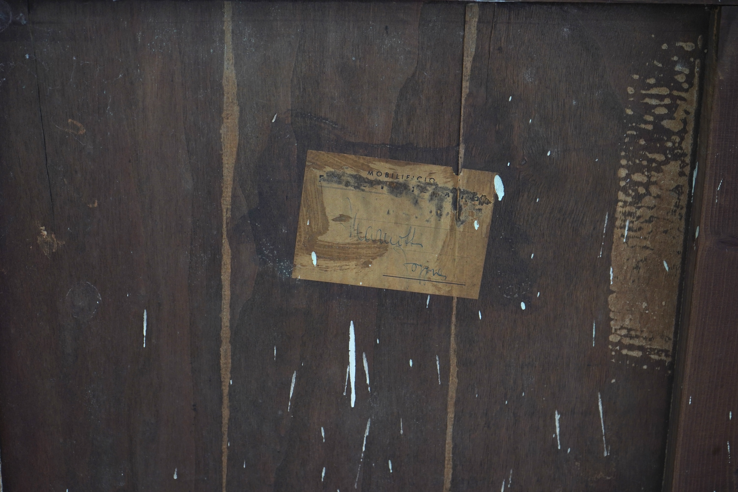 Osvaldo Borsani (Italian, 1911-1985) for Atelier Borsani Varedo: A large Indian rosewood and mahogany credenza, 276.5cm wide x 49cm deep x 94cm high